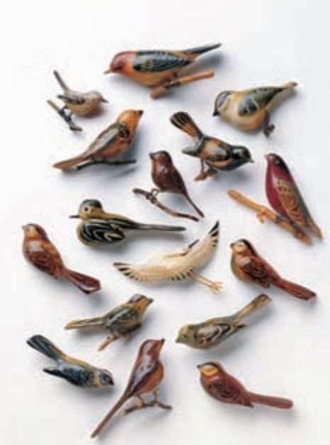 A collection of bird pins made by those interned in camps during World War II.