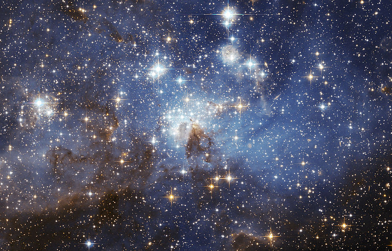 A photo of a blue and black sky with bright white stars