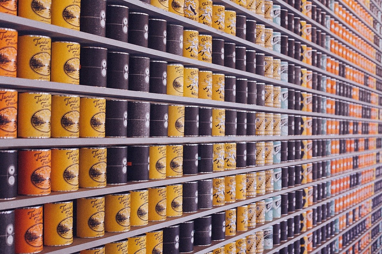 Photo of an aisle of canned food.