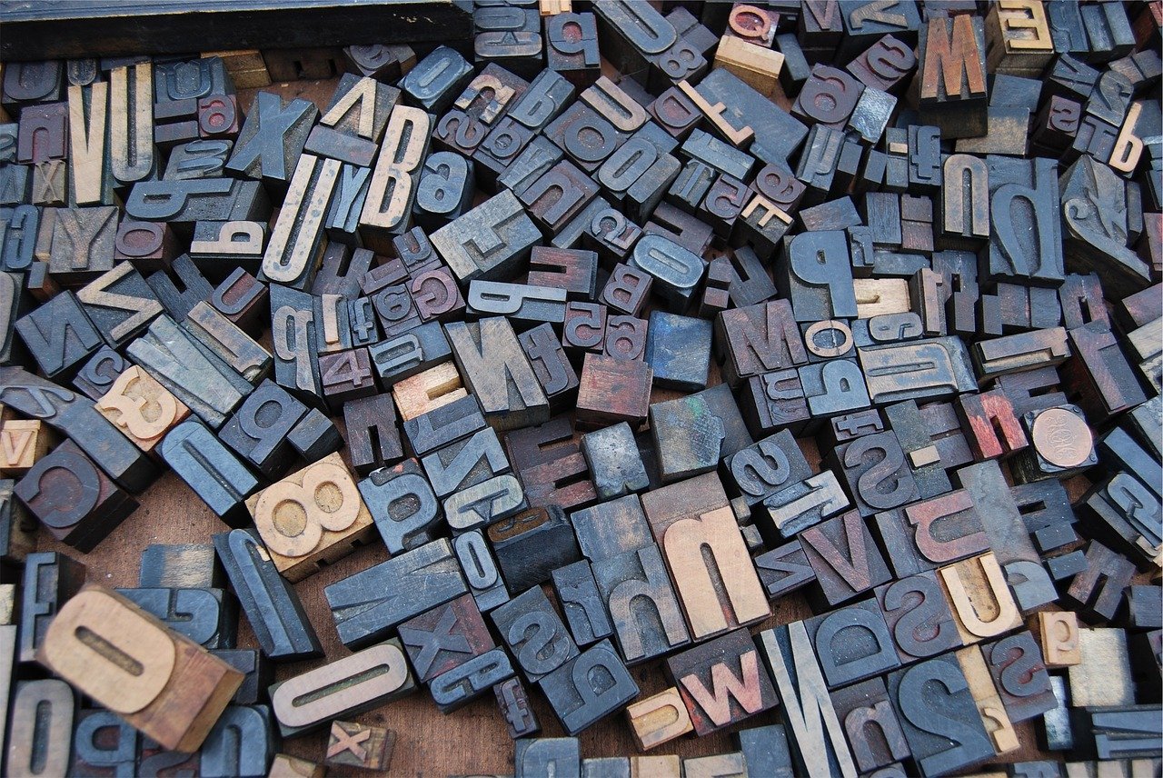 A photo of letters from a printing press
