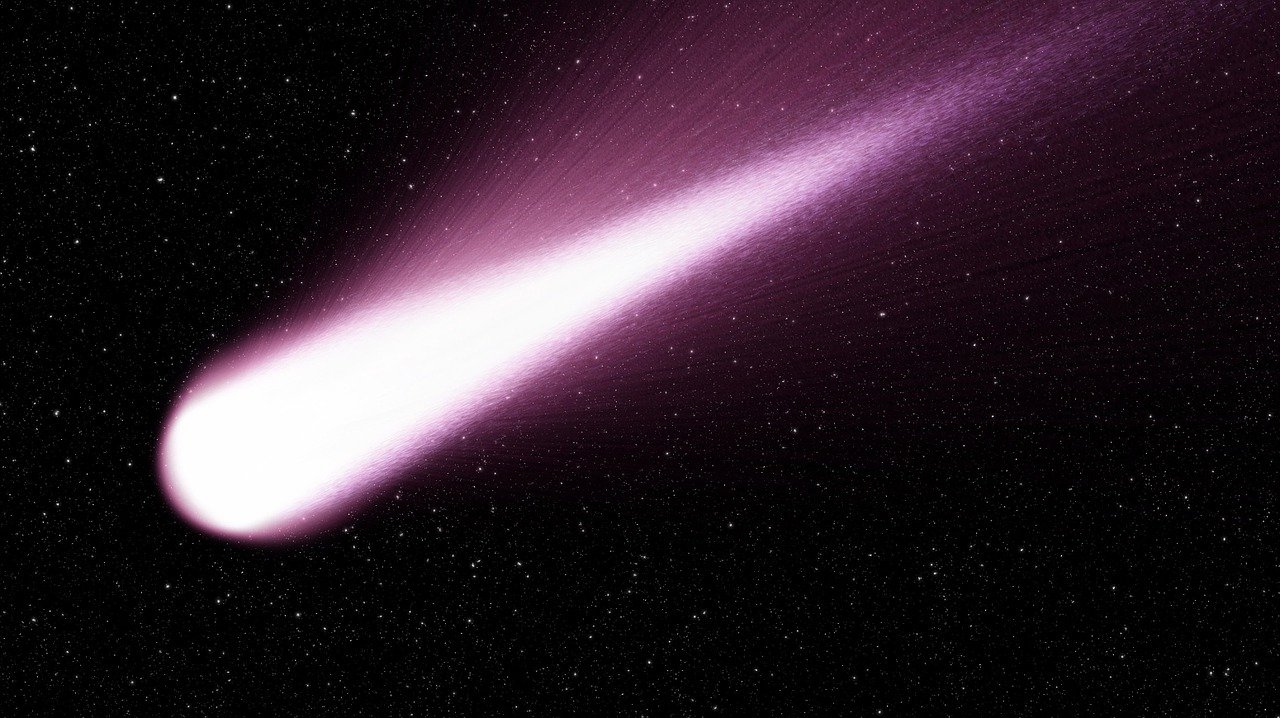 Image of a comet streaking across space