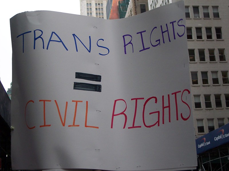 Photo of a sign that says "TRANS RIGHTS = CIVIL RIGHTS"