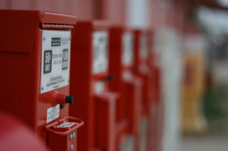 Photo of news paper vending machines.