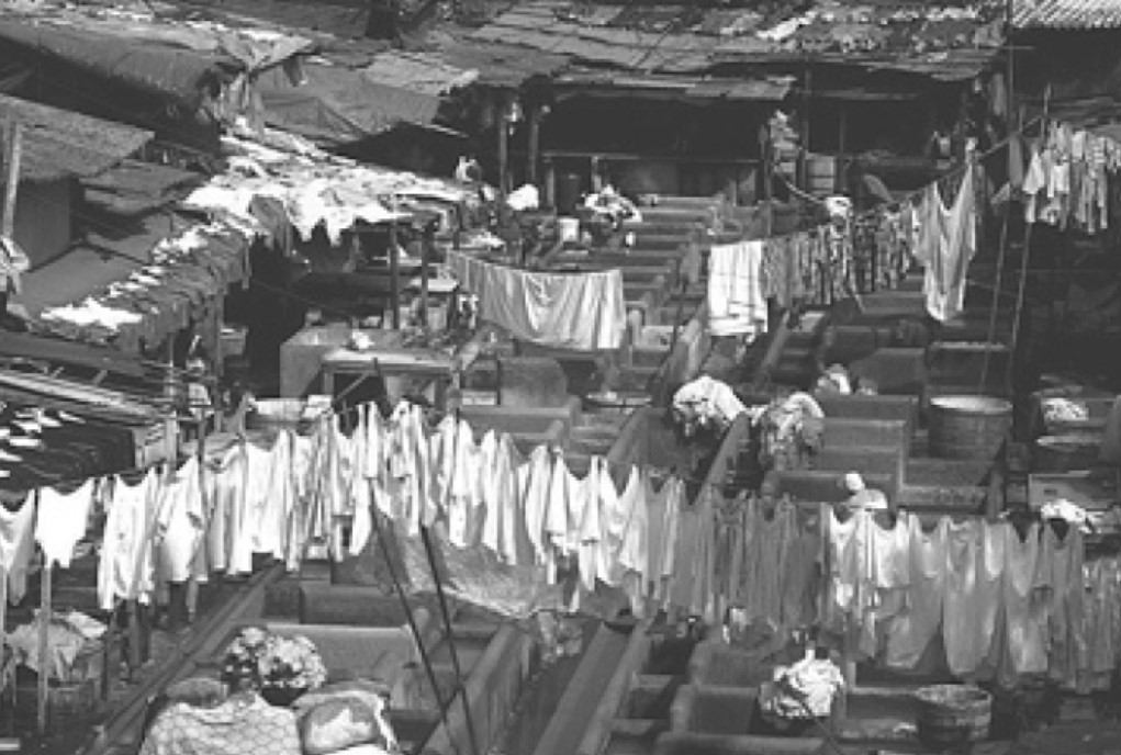 Photo of a extremely large amount of laundry hanging to dry