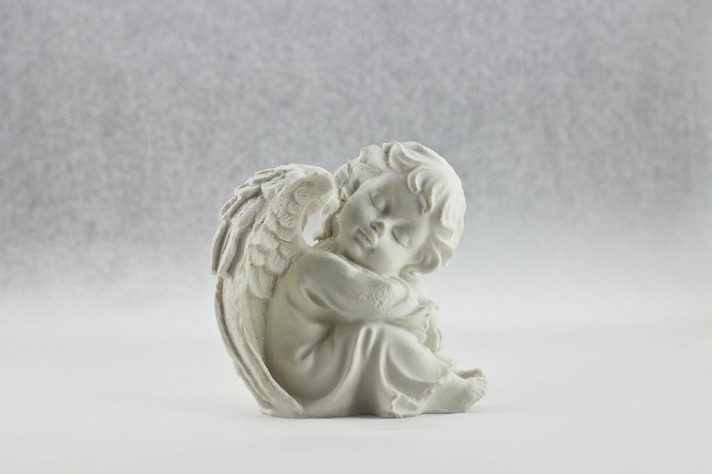 Photo of a small figurine of an angel