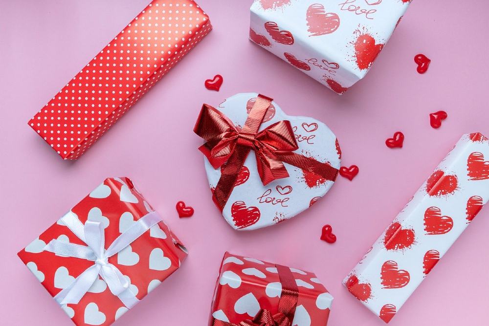 Photo of gifts decorated in heart decorated wrapping paper