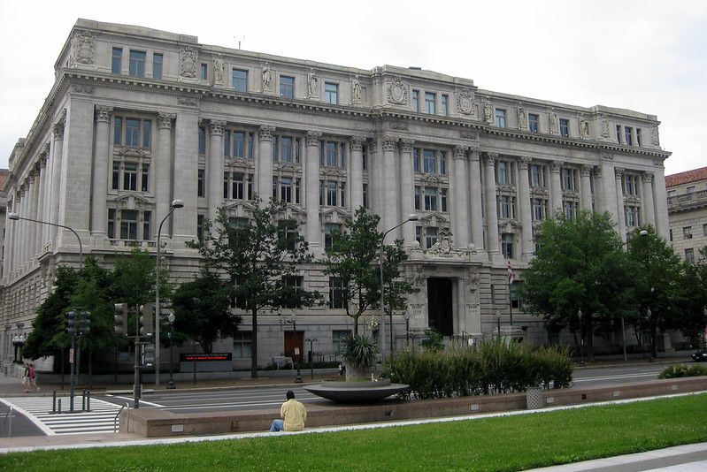 Photo of the front of the Wilson Building during summer time.