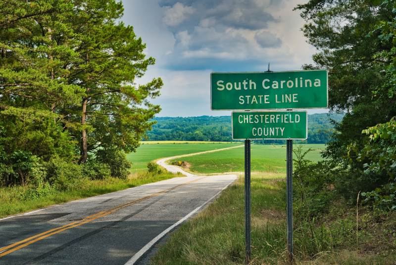 Photo of a road sign identifying the South Carolina state line