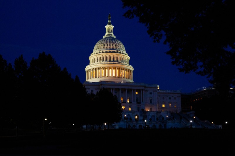 Photo of the US Capitol at night