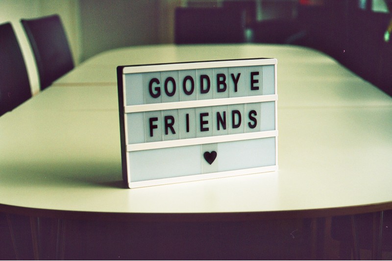 Photo of a small marque sign with a message reading "Goodbye Friends"