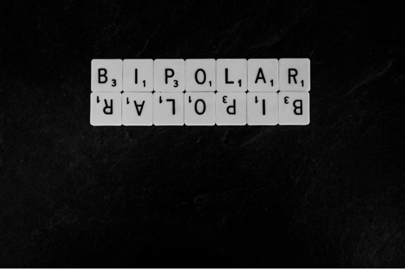 Photo of letter tiles spelling out bipolar; there are two sets, one upside down