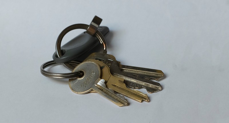 A photo of a set of keys and a key fob