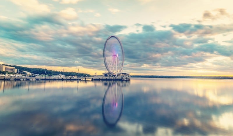 Photo of National Harbor, Maryland. A Ferris Wheel is prominent.