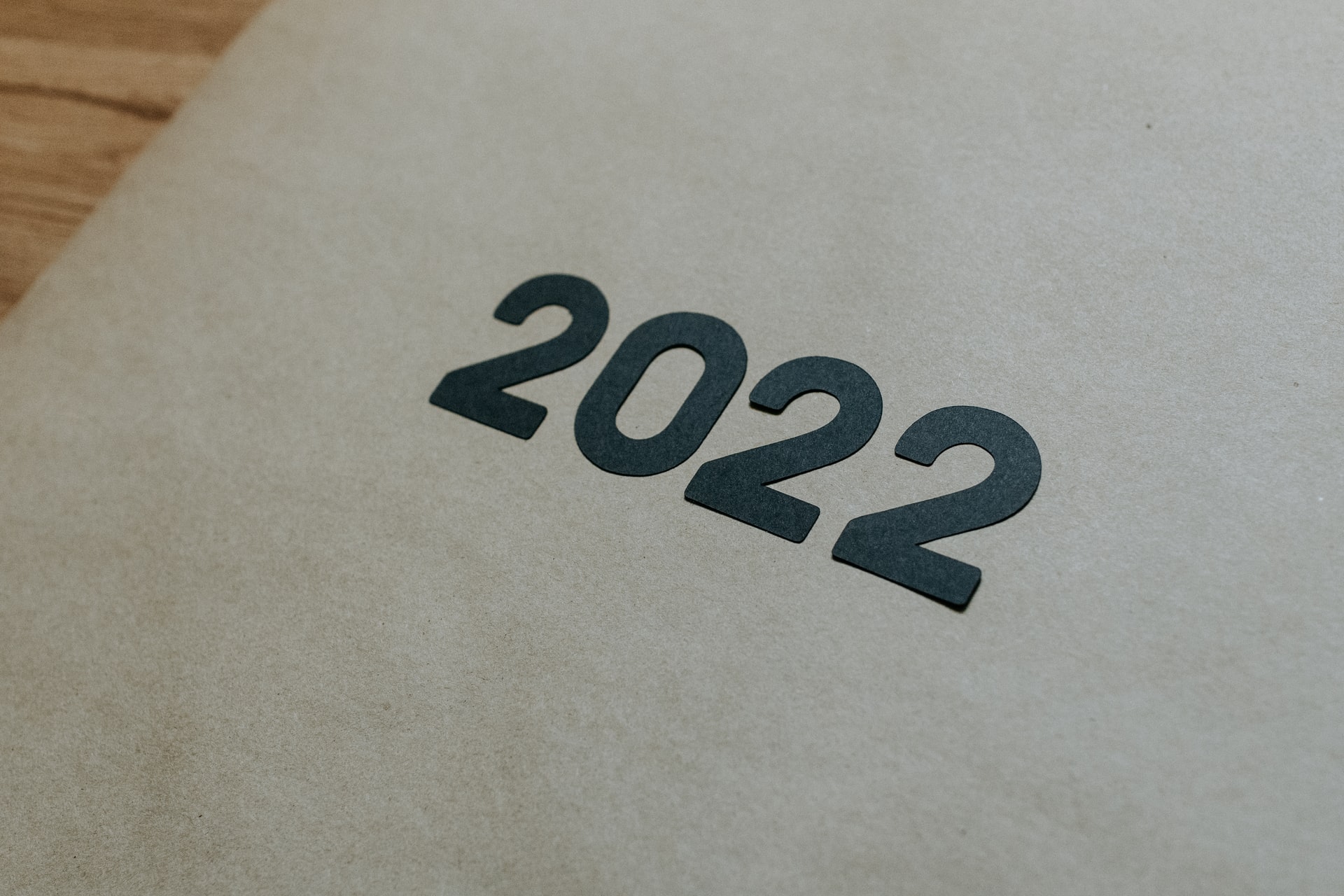A photo of a piece of paper with 2022 printed on it in grey.