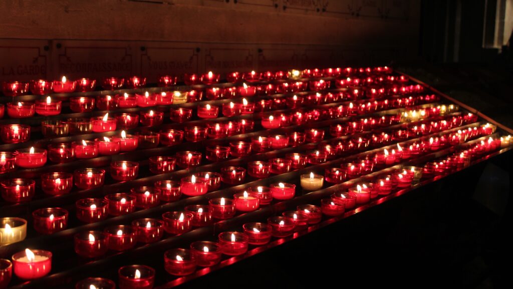 Photo of multiple lit candles