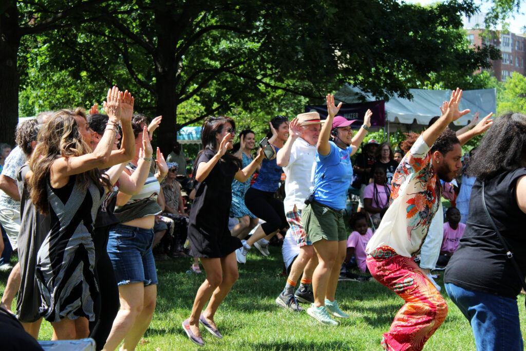 Festival attendees dance to Cheick Hamala and the Griot Street Band.