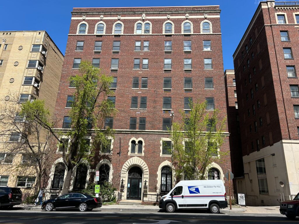 A brown tall building.